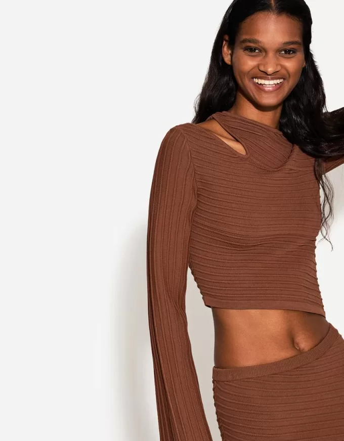 Asymmetric cut-out sweater Asymmetric cut-out sweater