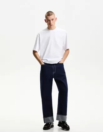 Baggy jeans with turn-up hems