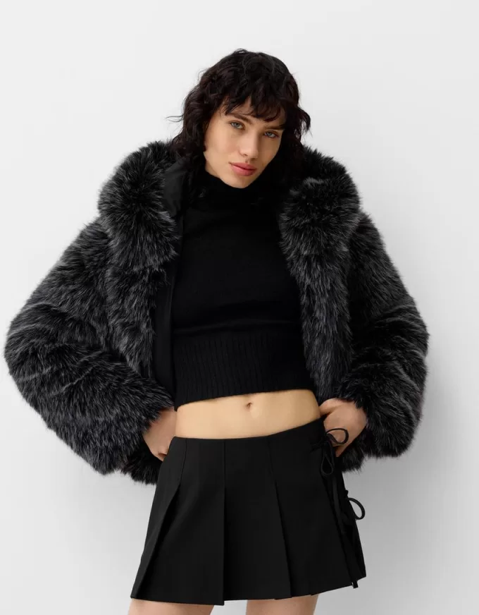 Box pleat mini skirt with bow detail Box pleat mini skirt with bow detail