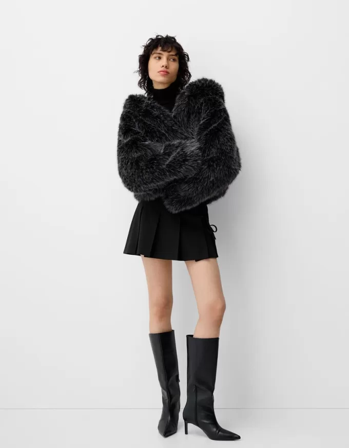 Box pleat mini skirt with bow detail Box pleat mini skirt with bow detail