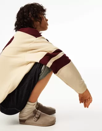 Buckled clogs with stud details