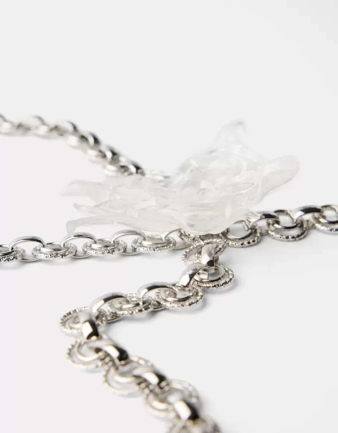 Chain belt with transparent flowers