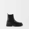 Chelsea boots with track soles Chelsea boots with track soles