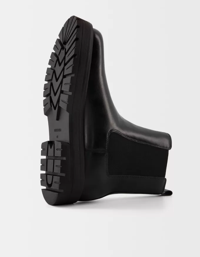 Chelsea boots with track soles Chelsea boots with track soles