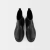Chelsea boots with track soles Chelsea boots with track soles