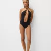 Cut out halter neck swimsuit Cut out halter neck swimsuit