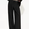 Darted pants with buckle Darted pants with buckle