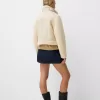 Double-sided jacket with faux shearling sleeves Double-sided jacket with faux shearling sleeves