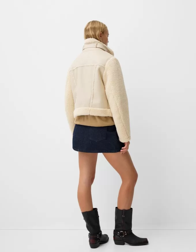 Double-sided jacket with faux shearling sleeves Double-sided jacket with faux shearling sleeves