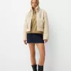 Double-sided jacket with faux shearling sleeves Double-sided jacket with faux shearling sleeves