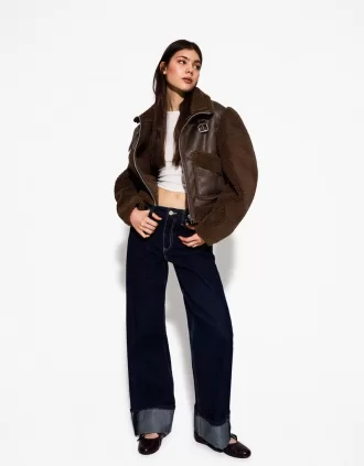 Double-sided jacket with faux shearling sleeves Double-sided jacket with faux shearling sleeves