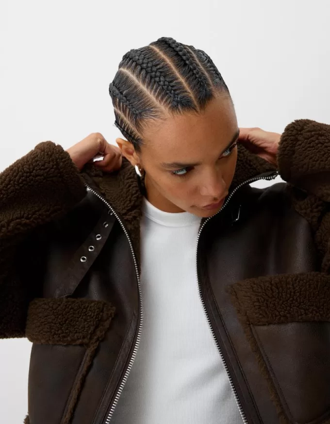 Double-sided jacket with faux shearling sleeves Double-sided jacket with faux shearling sleeves