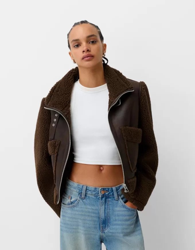 Double-sided jacket with faux shearling sleeves Double-sided jacket with faux shearling sleeves