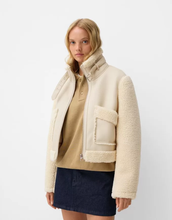 Double-sided jacket with faux shearling sleeves Double-sided jacket with faux shearling sleeves