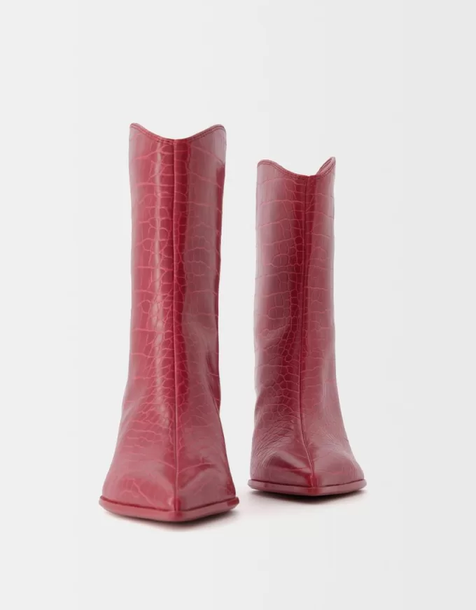 Embossed animal print heeled ankle boots