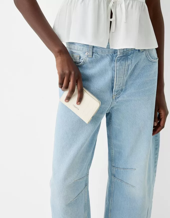 Embossed faux-patent finish animal print purse Embossed faux-patent finish animal print purse