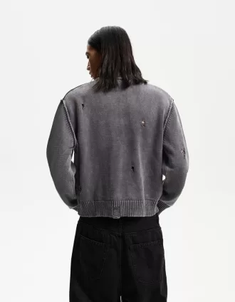 Faded ripped sweater