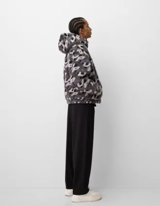 Faux shearling jacket with print