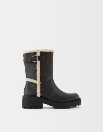 Flat ankle boots with faux shearling detail