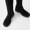 Flat fitted knee-high boots