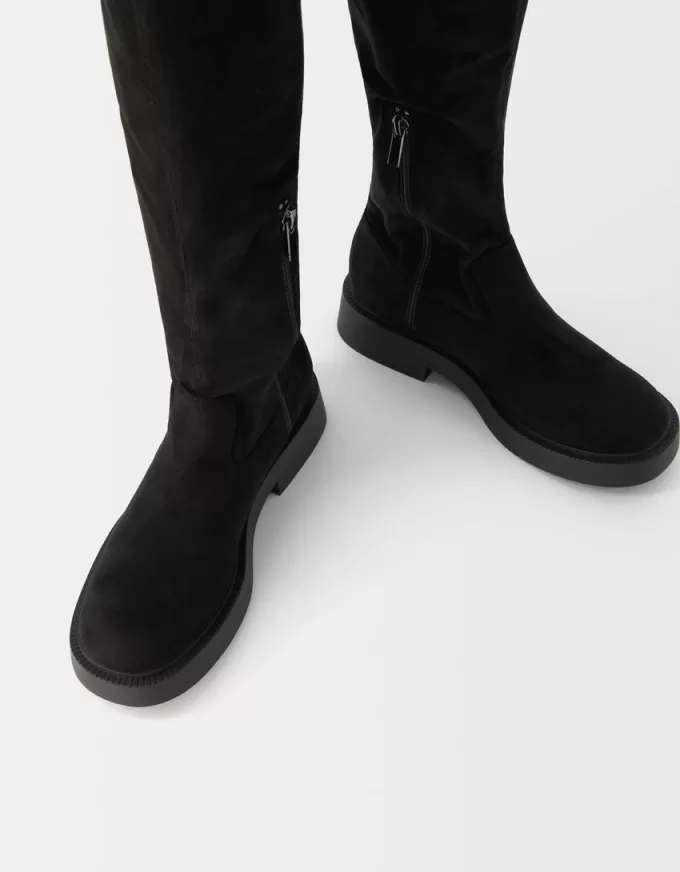 Flat fitted knee-high boots