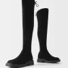 Flat fitted knee-high boots