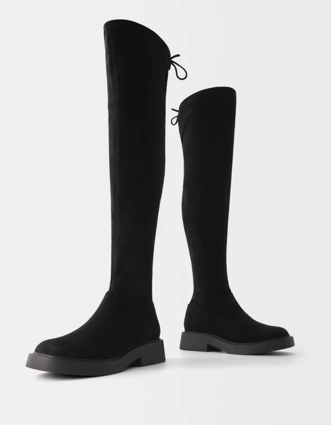 Flat fitted knee-high boots