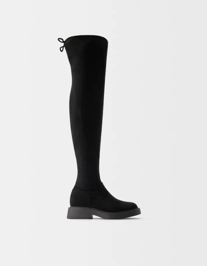 Flat fitted knee-high boots