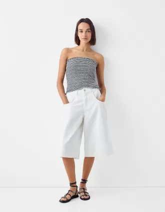 Flat sandals with ring details