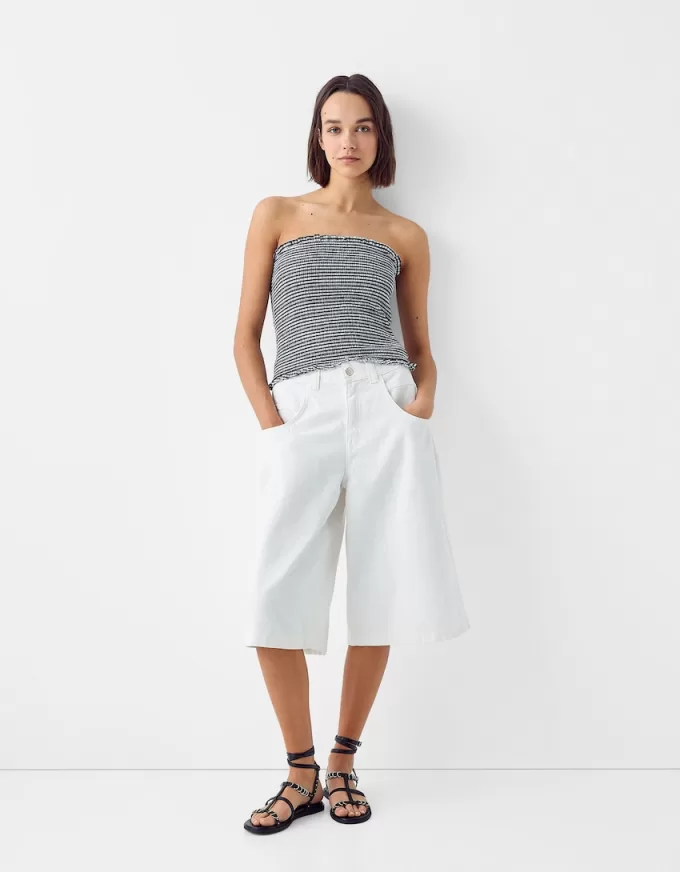 Flat sandals with ring details