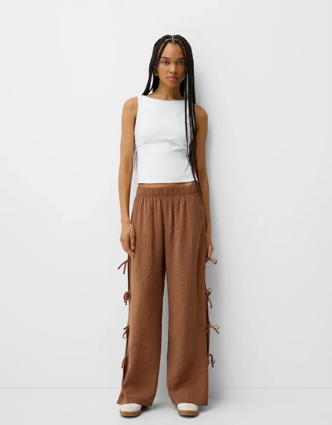 Flowing pants with side ties Flowing pants with side ties