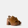 High-heel studded platform clogs High-heel studded platform clogs