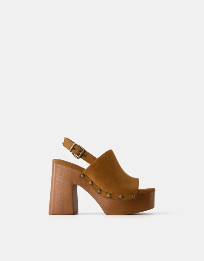 High-heel studded platform clogs High-heel studded platform clogs