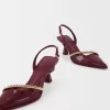 Kitten-heel shoes with chain detail Kitten-heel shoes with chain detail