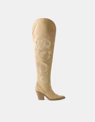 Knee-high high-heel cowboy boots