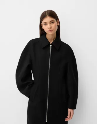 Long Manteco wool coat with puff sleeves