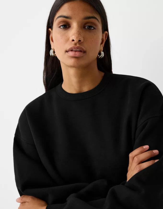 Oversize sweatshirt with side pockets