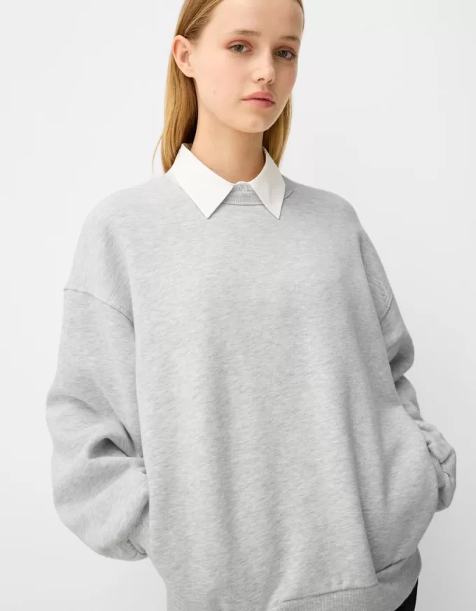Oversize sweatshirt with side pockets