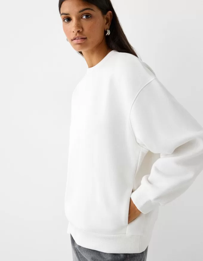 Oversize sweatshirt with side pockets