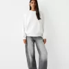 Oversize sweatshirt with side pockets