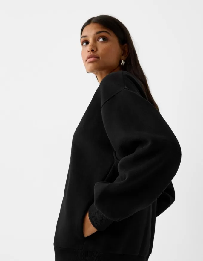 Oversize sweatshirt with side pockets