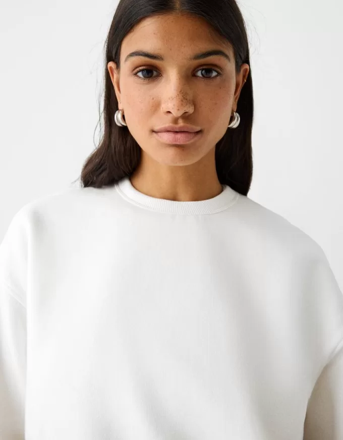 Oversize sweatshirt with side pockets