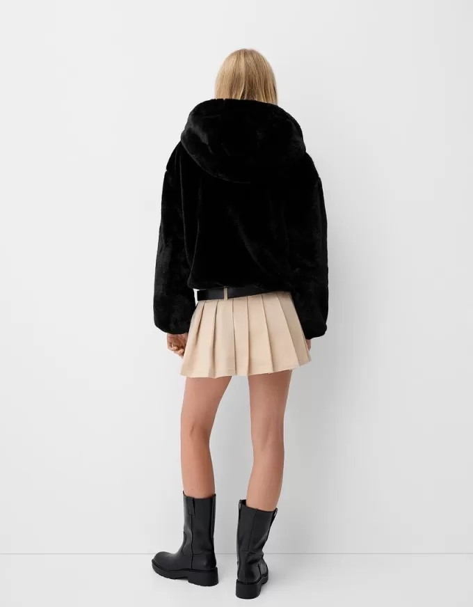 Quilted jacket with faux fur hood Quilted jacket with faux fur hood