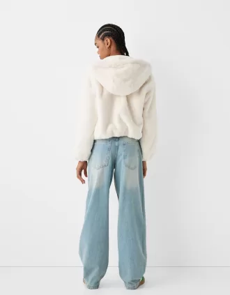 Quilted jacket with faux fur hood