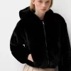 Quilted jacket with faux fur hood Quilted jacket with faux fur hood