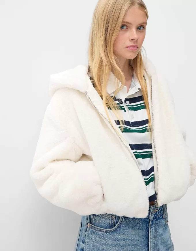 Quilted jacket with faux fur hood Quilted jacket with faux fur hood