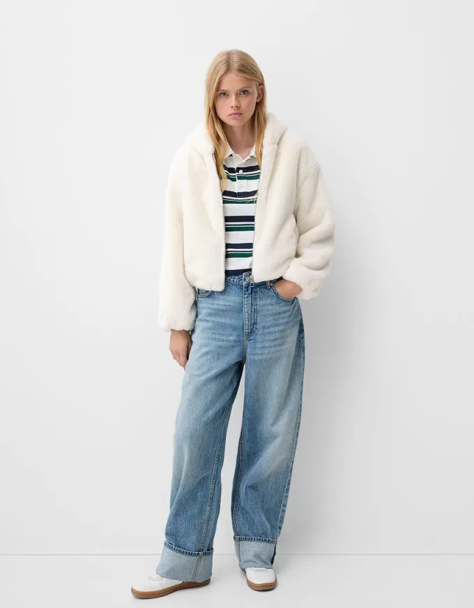 Quilted jacket with faux fur hood Quilted jacket with faux fur hood