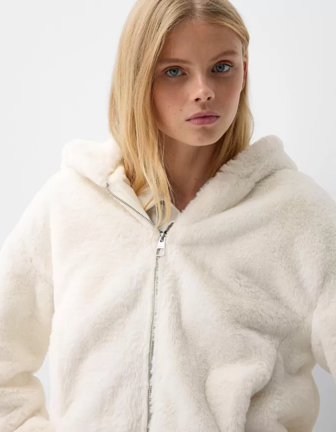 Quilted jacket with faux fur hood Quilted jacket with faux fur hood