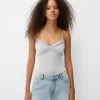 Ruffled bodysuit with straps Ruffled bodysuit with straps