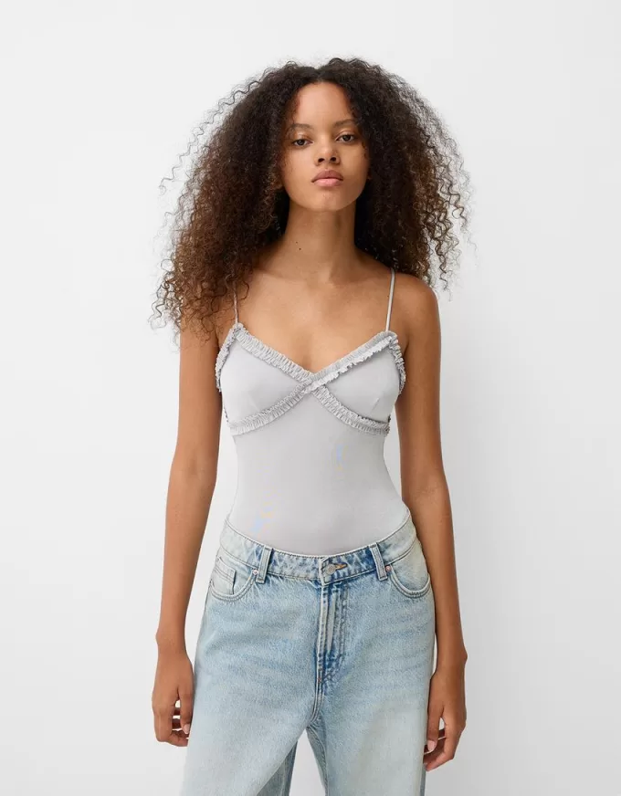 Ruffled bodysuit with straps Ruffled bodysuit with straps